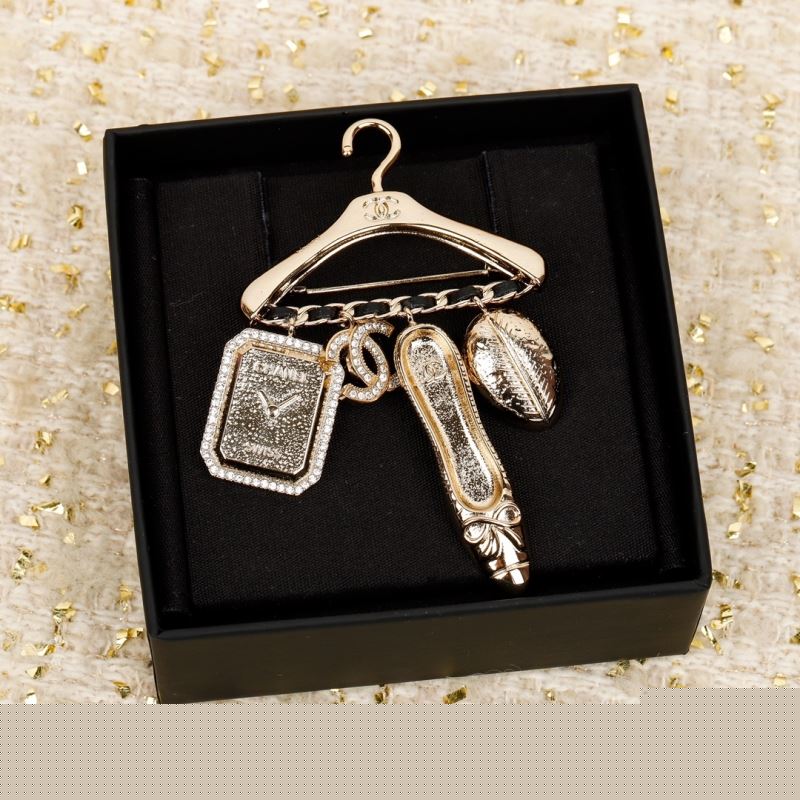 Ch*el brooches